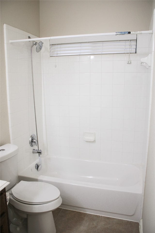 full bathroom with vanity, toilet, and tiled shower / bath