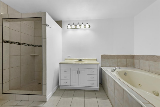 bathroom featuring tile patterned flooring, vanity, and independent shower and bath