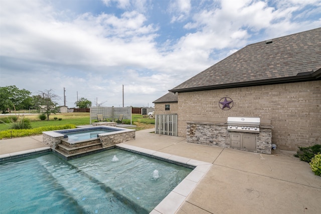 view of swimming pool featuring area for grilling, pool water feature, a patio, and an in ground hot tub