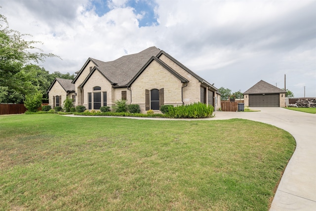 french provincial home featuring a front lawn