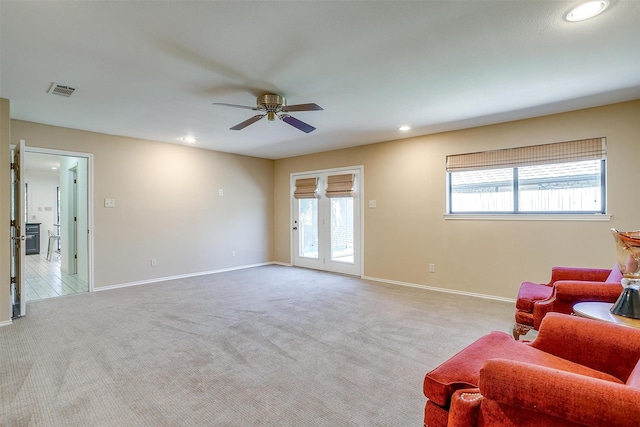 interior space with ceiling fan and plenty of natural light