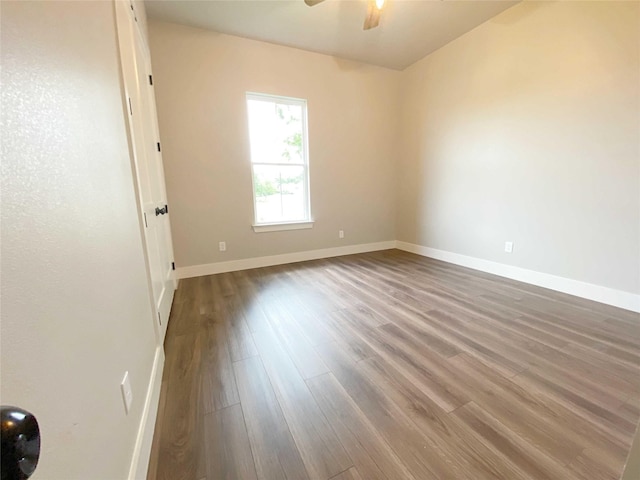 unfurnished room featuring ceiling fan and hardwood / wood-style flooring