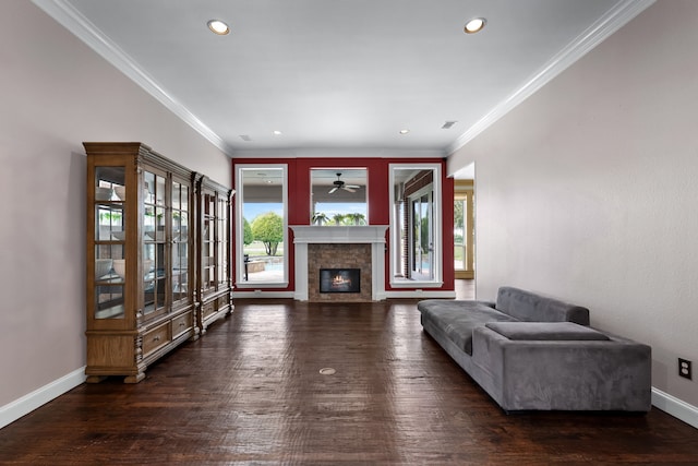 living room featuring dark wood-type flooring, ceiling fan, and ornamental molding