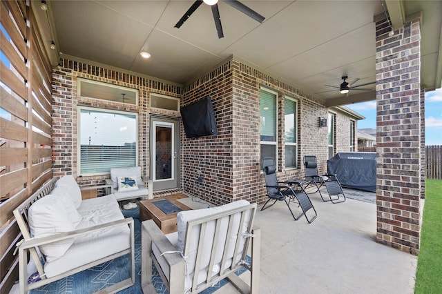 view of patio / terrace with ceiling fan and an outdoor hangout area