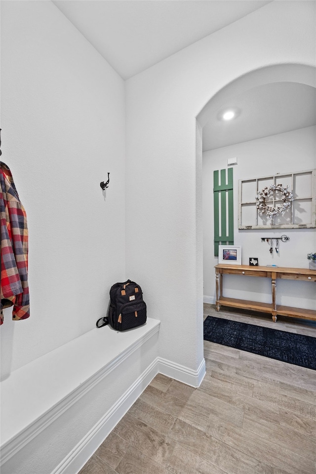 mudroom with hardwood / wood-style flooring