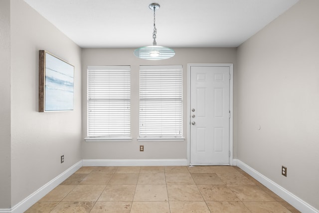 interior space with light tile patterned floors