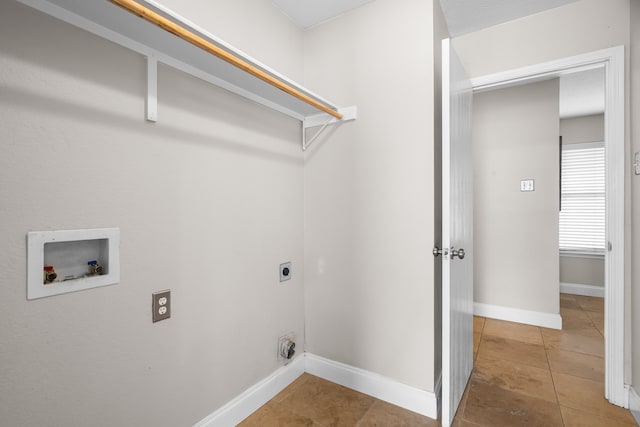 laundry area with washer hookup, light tile patterned floors, and electric dryer hookup