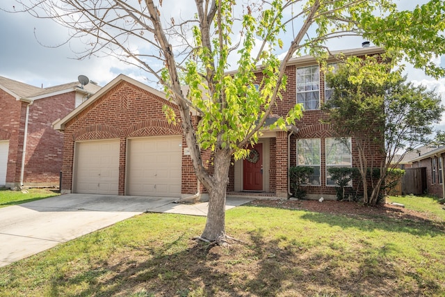 view of front of home with a front yard and a garage