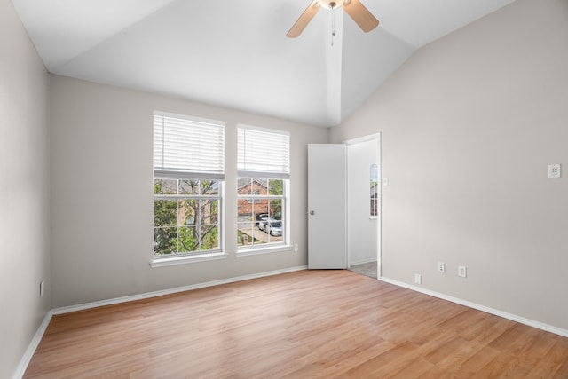 unfurnished room featuring vaulted ceiling, ceiling fan, and light hardwood / wood-style floors