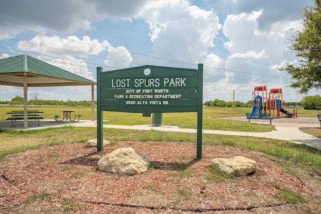 view of property's community with a playground