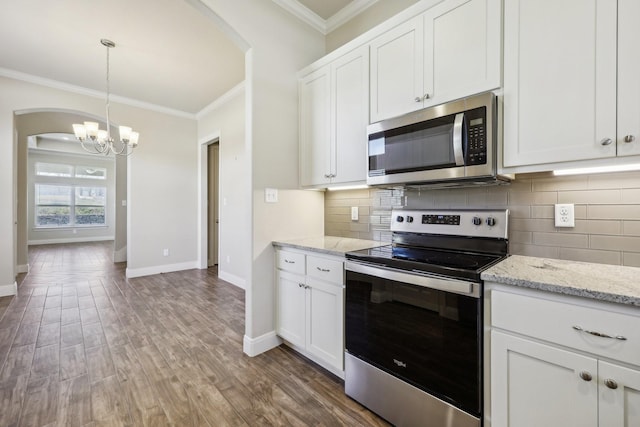 kitchen with white cabinetry and appliances with stainless steel finishes