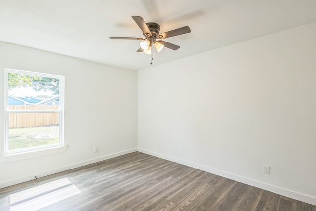 empty room featuring ceiling fan and wood-type flooring