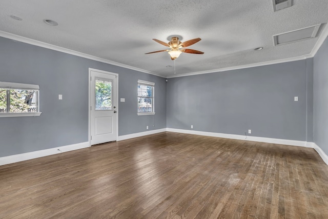 spare room with ceiling fan, hardwood / wood-style flooring, crown molding, and a textured ceiling