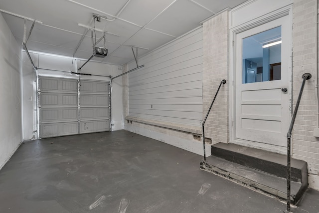 garage featuring a garage door opener