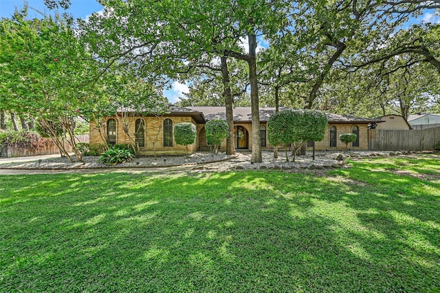 view of front of property with a front lawn