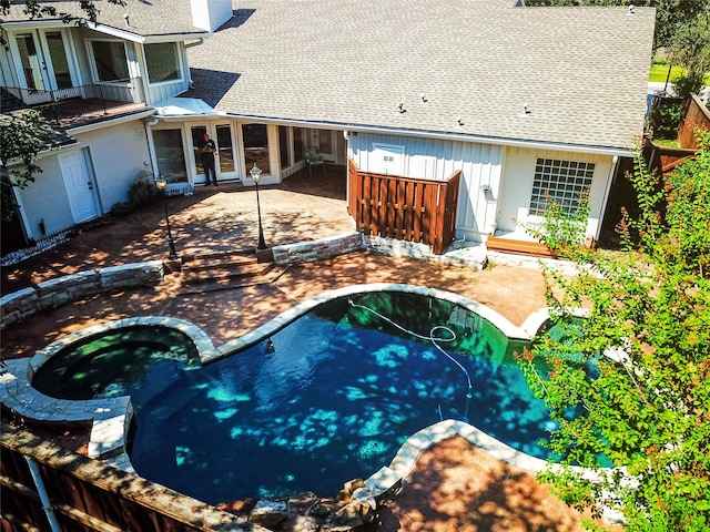 view of pool featuring french doors, a hot tub, and a patio