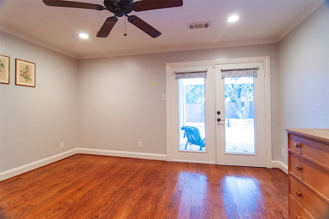 doorway to outside featuring ornamental molding, french doors, hardwood / wood-style floors, and ceiling fan