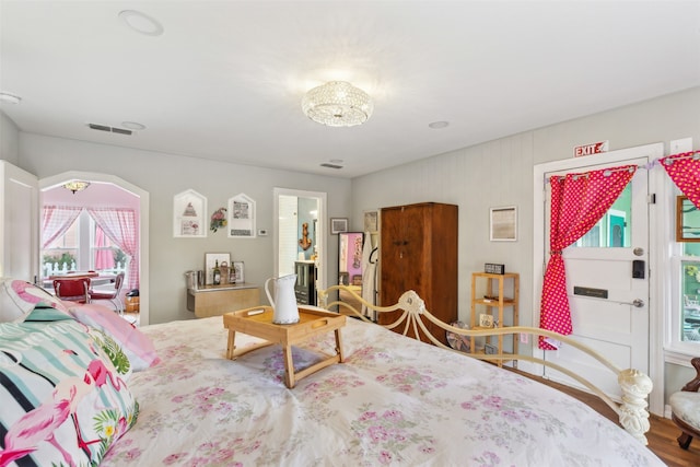 bedroom featuring wood-type flooring