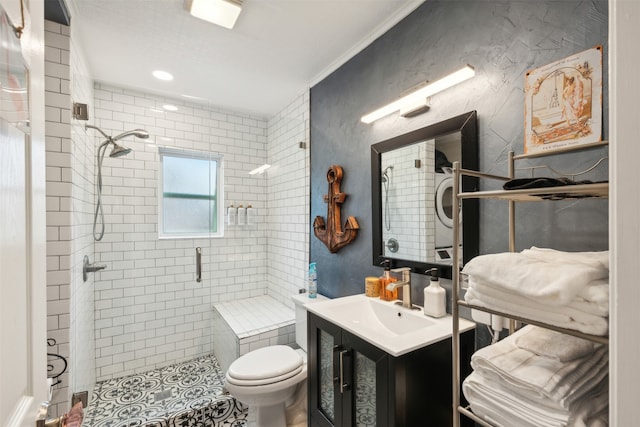 bathroom with ornamental molding, vanity, toilet, and a shower with door