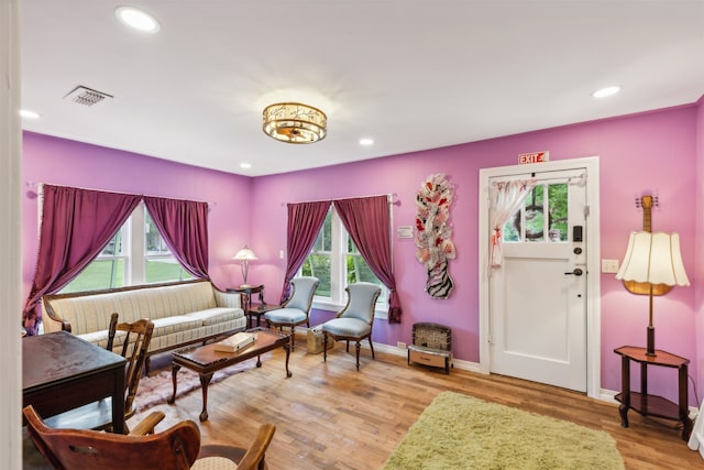 sitting room featuring light hardwood / wood-style flooring