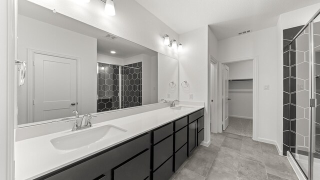 bathroom featuring tile patterned floors and walk in shower