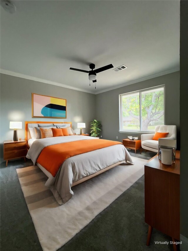 carpeted bedroom featuring ceiling fan and ornamental molding