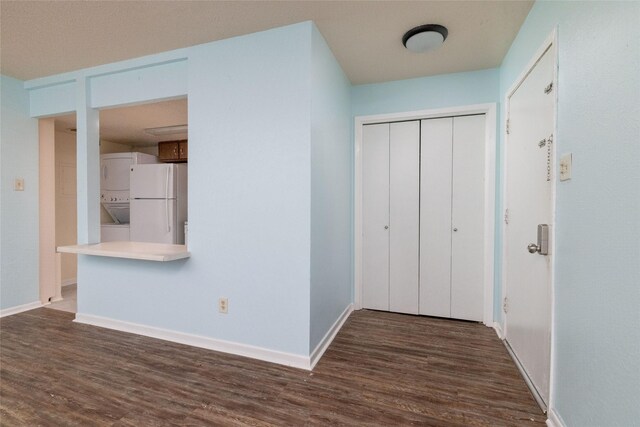 104 Harbor Dr Unit 111, Runaway Bay, TX 76426 - hallway featuring dark wood-type flooring and baseboards