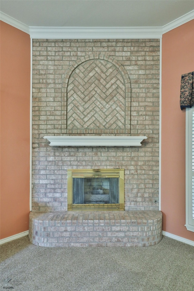 interior details with crown molding, a brick fireplace, and carpet flooring