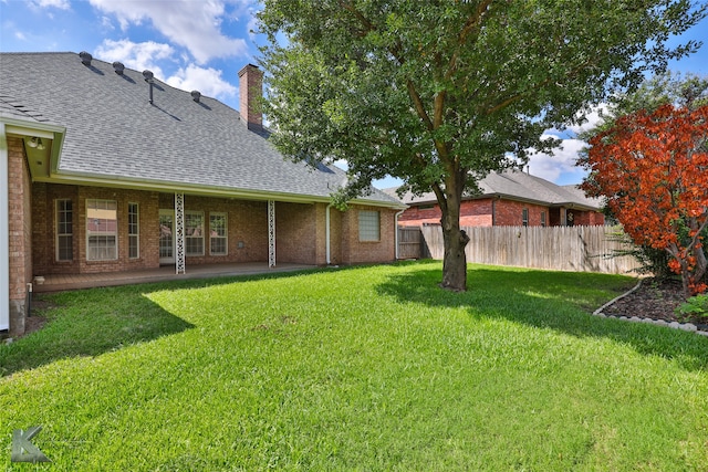 view of yard with a patio area