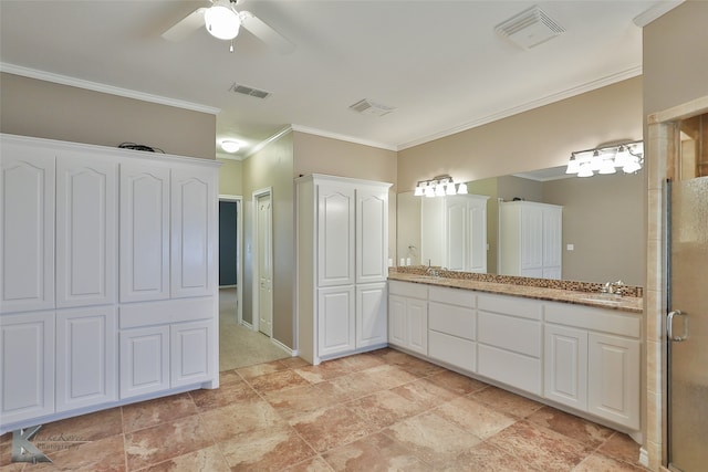 bathroom featuring ceiling fan, an enclosed shower, crown molding, and vanity