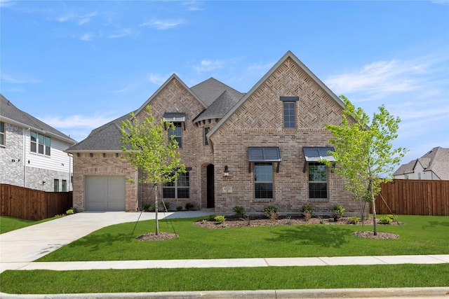 4100 Pond Cypress St, Aubrey, TX 76227 - view of front of property featuring fence, an attached garage, driveway, and brick siding