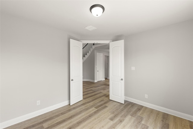 4100 Pond Cypress St, Aubrey, TX 76227 - empty room with baseboards and light wood finished floors