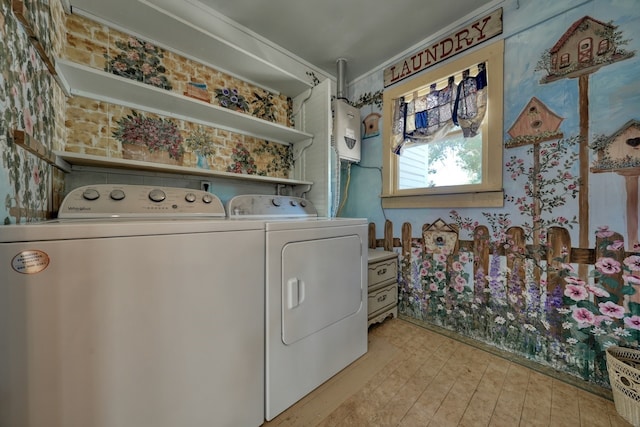 laundry room featuring washing machine and clothes dryer