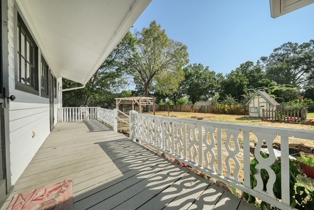 deck featuring a storage unit