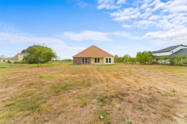 view of yard with a rural view