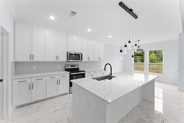 kitchen with a center island with sink, appliances with stainless steel finishes, sink, light stone counters, and white cabinets