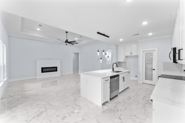 kitchen featuring white cabinets, dishwasher, ceiling fan, pendant lighting, and ornamental molding