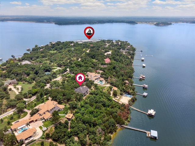 birds eye view of property featuring a water view