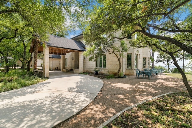 view of front of property with a carport