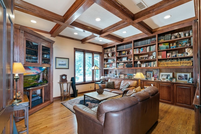 interior space with coffered ceiling, beamed ceiling, and light wood-type flooring