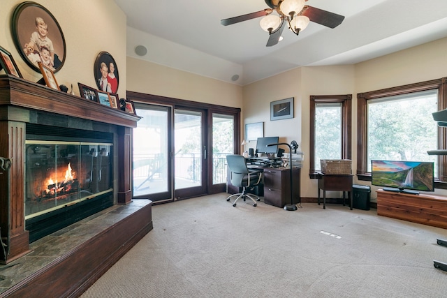 office area featuring vaulted ceiling, ceiling fan, and carpet floors