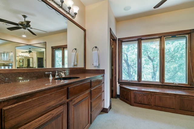 bathroom with vanity, a wealth of natural light, and ceiling fan