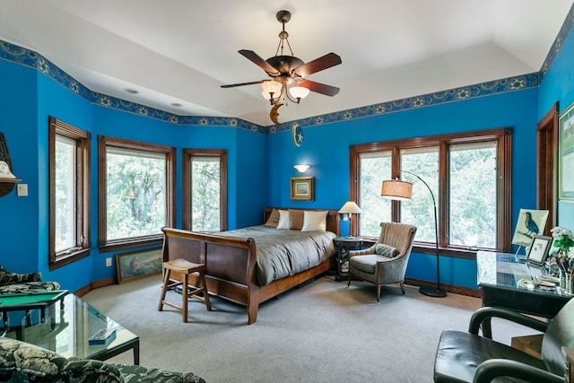 bedroom with ceiling fan and carpet