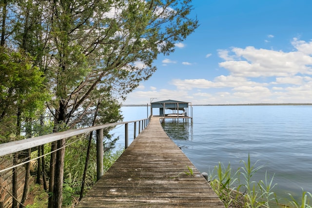 dock area featuring a water view