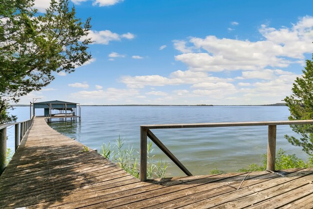 dock area featuring a water view