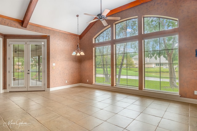 interior space with ceiling fan with notable chandelier, lofted ceiling with beams, and light tile patterned floors