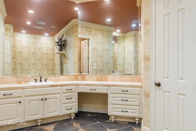 bathroom featuring vanity and ornamental molding