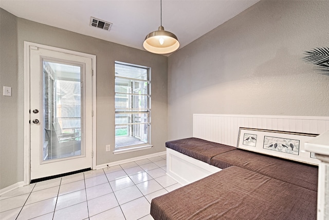 entryway featuring light tile patterned floors