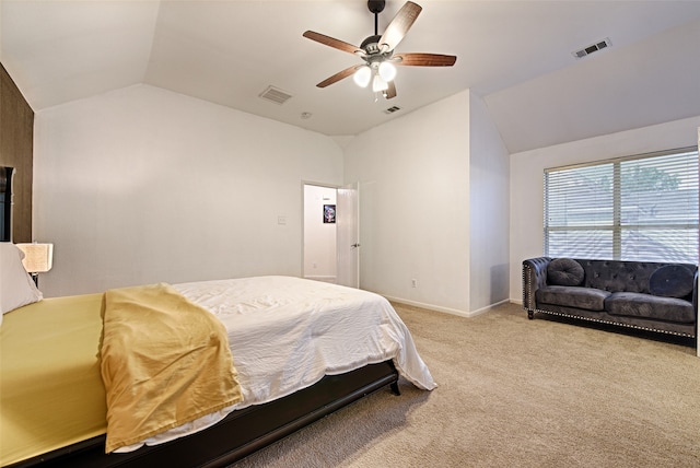 bedroom featuring light colored carpet, ceiling fan, and vaulted ceiling