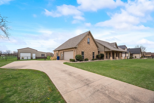 view of front of home with a garage and a front yard